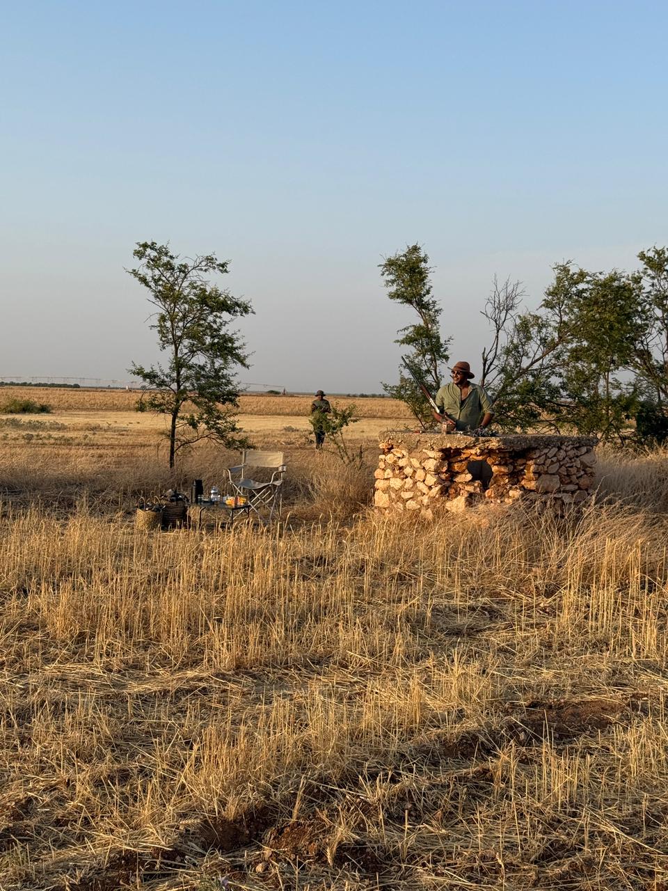 Hunter at a stone hunting blind, Morocco